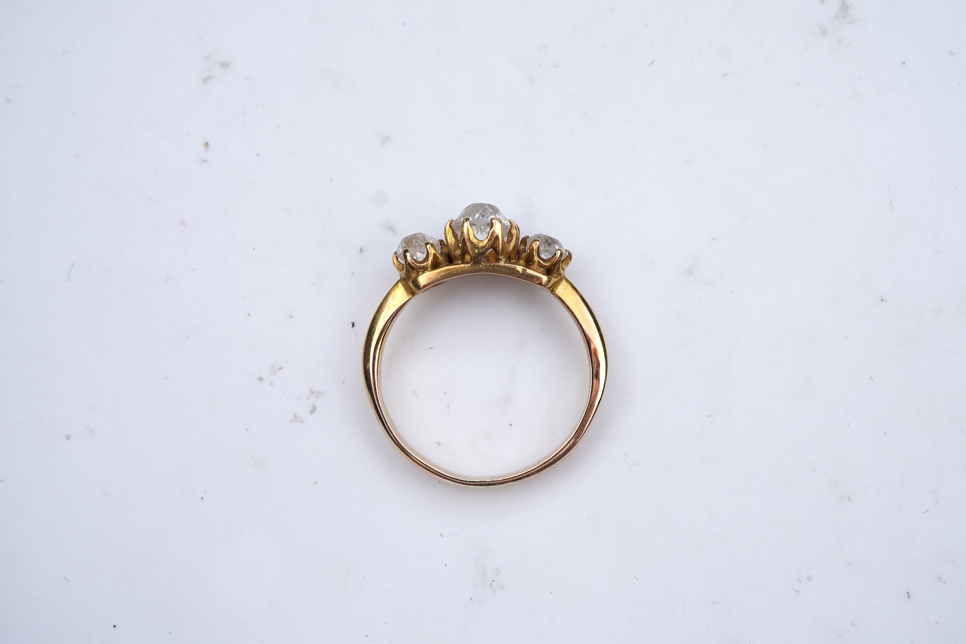 A three-stone diamond ring, early 20th century